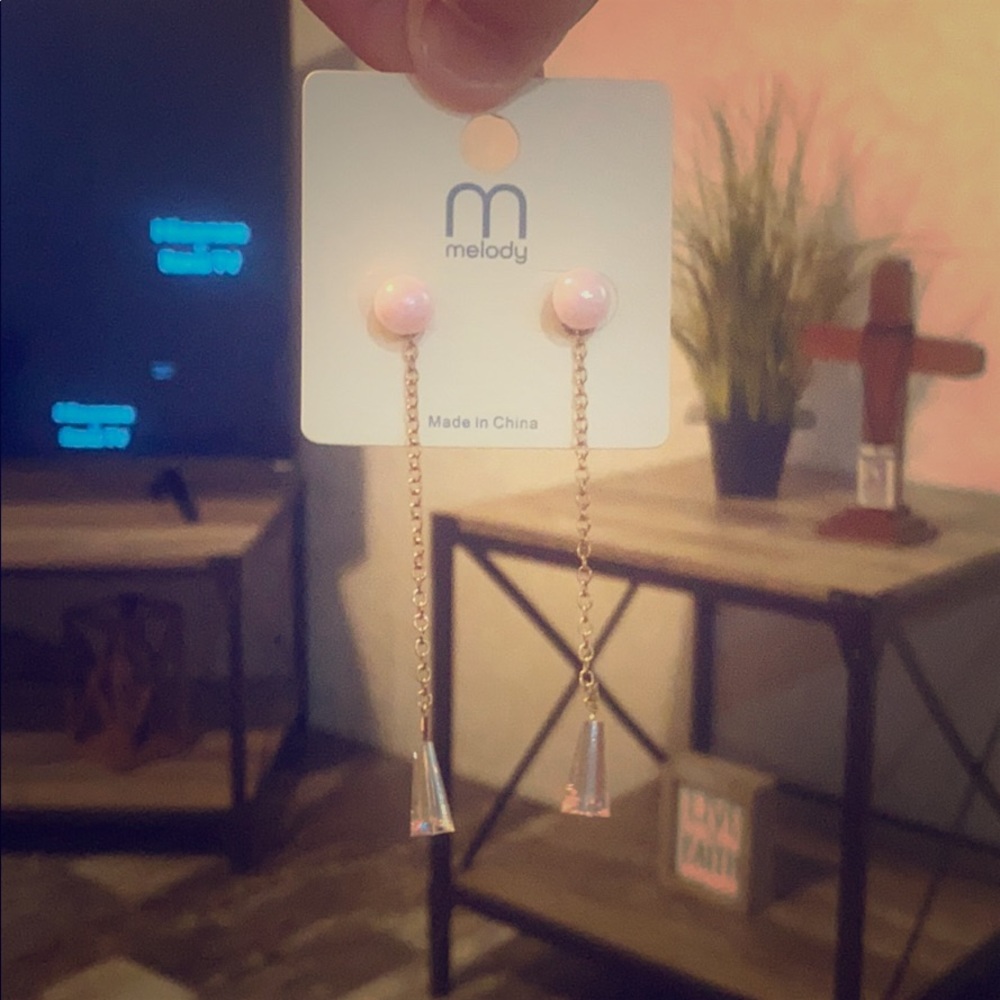 Pink and gold earings.